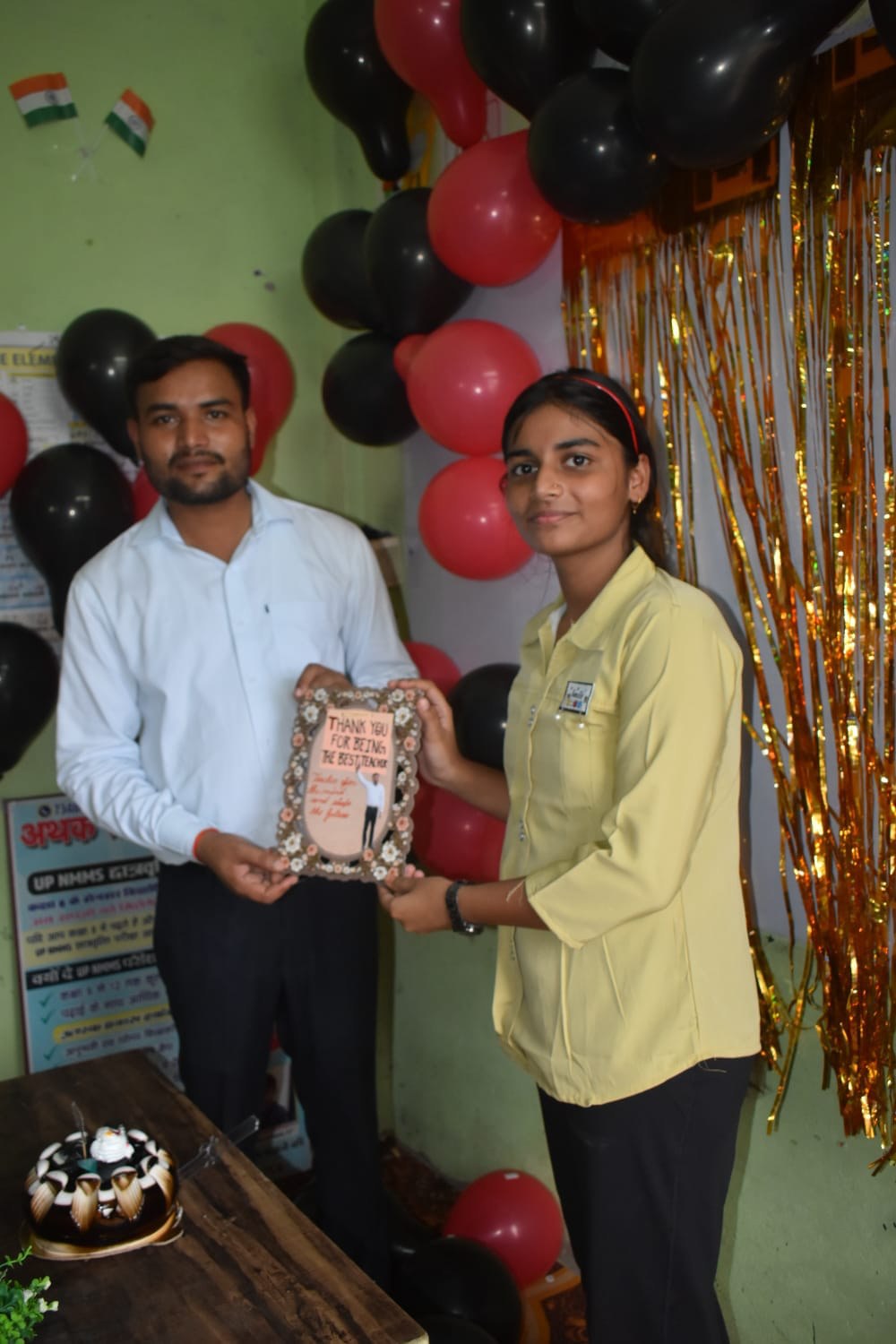 A student presents a thank-you gift to her teacher