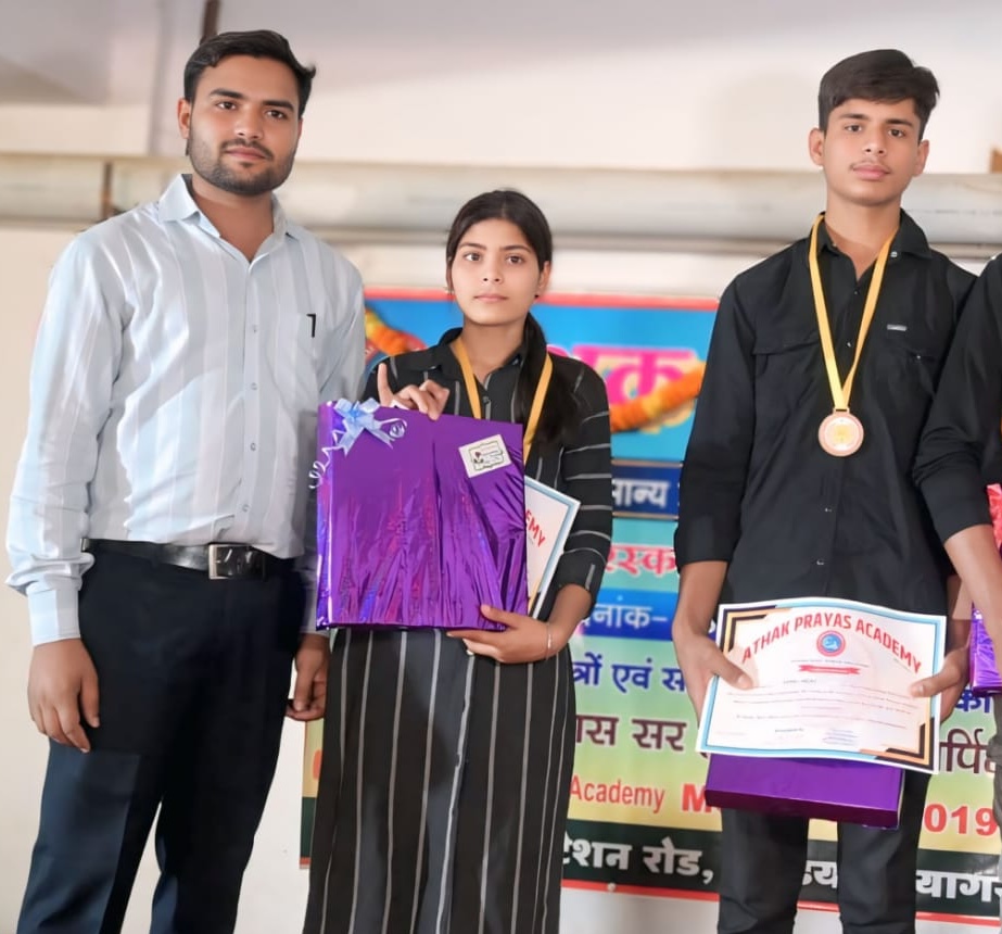 Students display prizes received at the academy